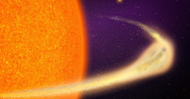 This planet is crumbling apart, giving it a giant tail like a comet