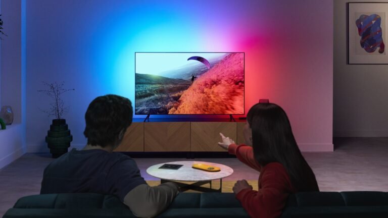 People watch TV with WiZ TV Sync Box with backlight