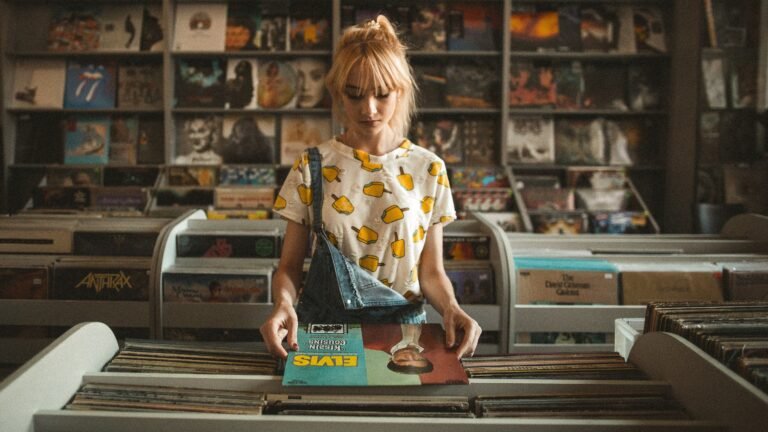 Image of a woman looking at records in a record store